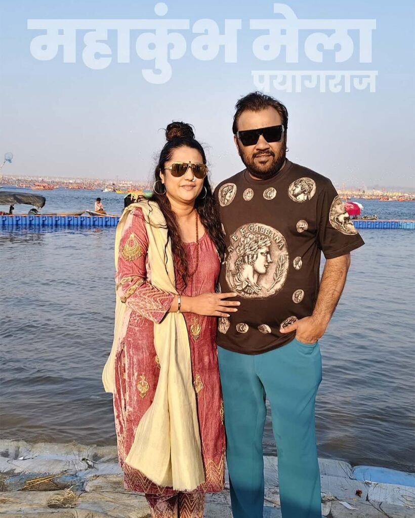 Kirtidan gadhvi with his wife at mahakumbh 2025.